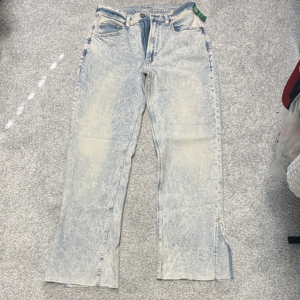 GAP Women’s 90’s loose high rise  Faded Blue Jeans with raw hem and slit leg